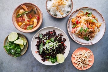 a bowl filled with different types of food on a plate