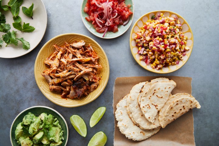 a bowl filled with different types of food on a table