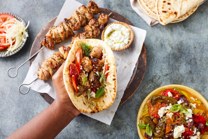 a couple of hot dogs with different toppings