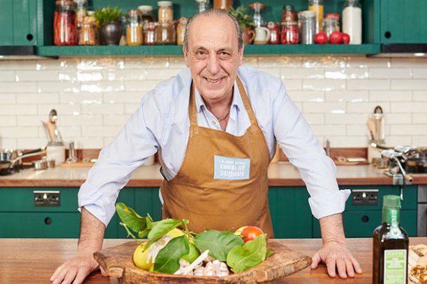 Gennaro Contaldo preparing food in a kitchen