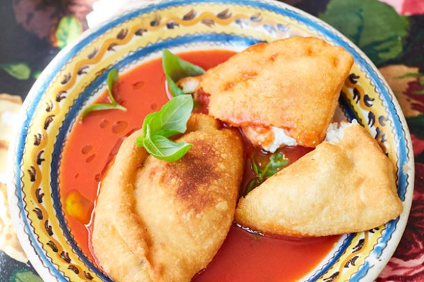 a plate of pizza fritters