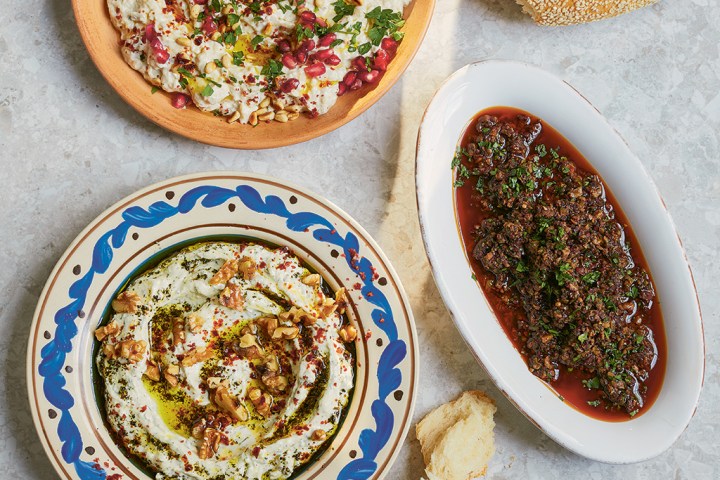a pizza sitting on top of a plate of food