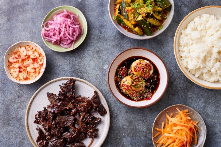 a bowl filled with different types of food on a table