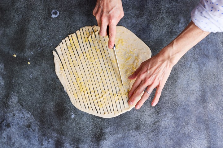 a hand holding a knife