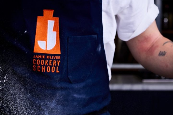 a man that is standing in the water