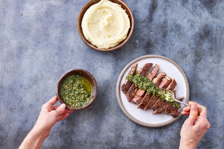 a person holding a plate of food