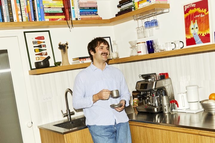 a person standing in a kitchen